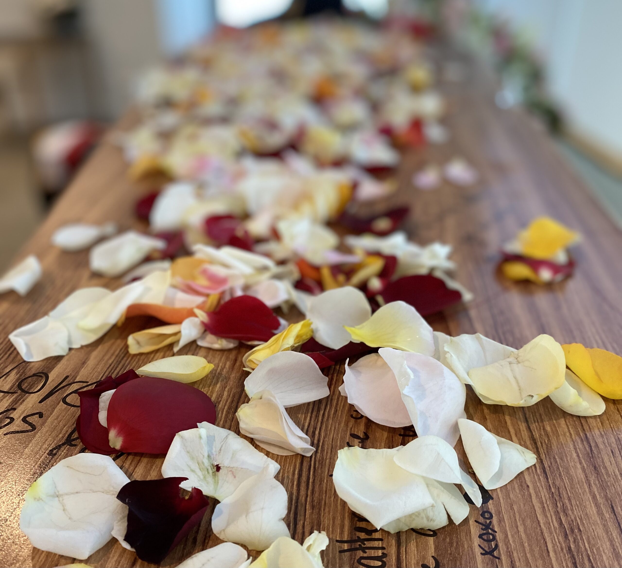 Soulful Celebrations flower petals on coffin